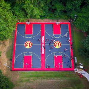 commercial outdoor basketball court flooring with Atlanta Hawks theme built by CBA Sports