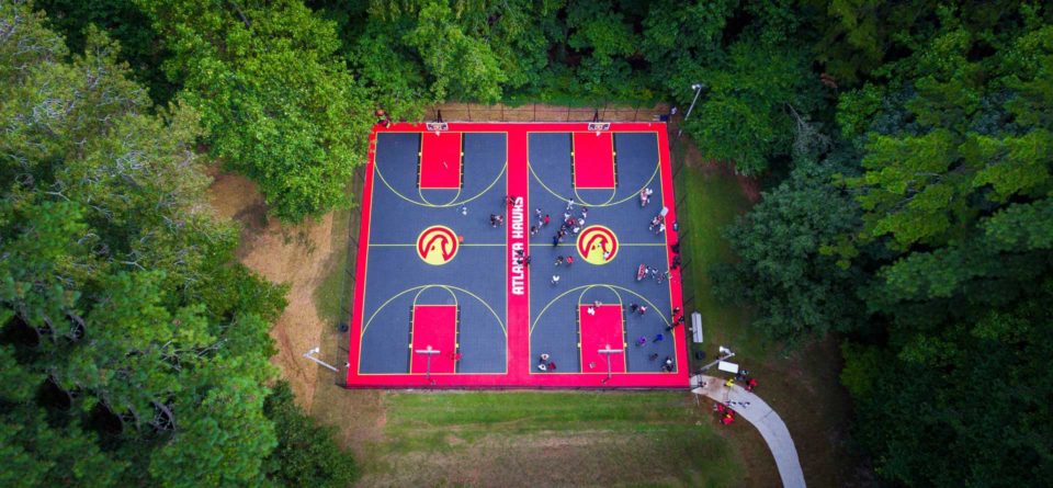 commercial outdoor basketball court flooring with Atlanta Hawks theme built by CBA Sports