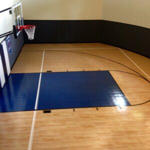 Indoor half court basketball court flooring completed installation.