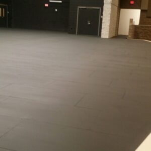 Indoor flooring of an auditorium stage.