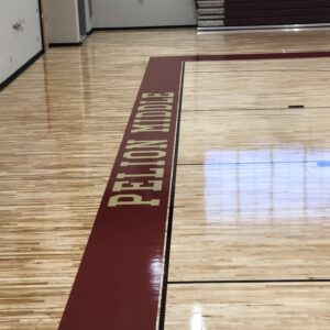 Pelion middle basketball court sideline completed court flooring.