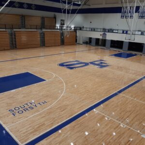 South forsyth basketball court completed basketball flooring.