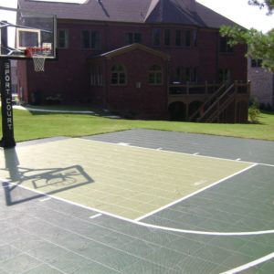 green backyard basketball court with no fence installed by CBA Sports