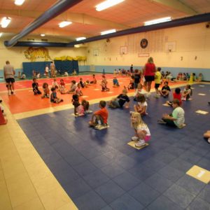 sport court floor being used inside an elementary school for gym class